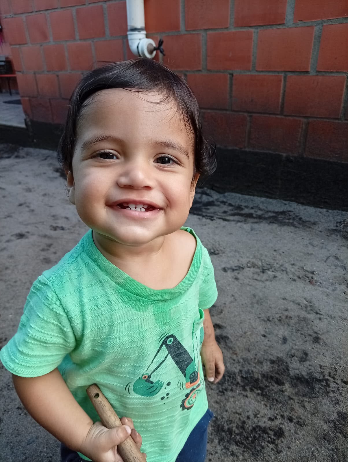 Bebê em uma vivência ao ar livre na OCA